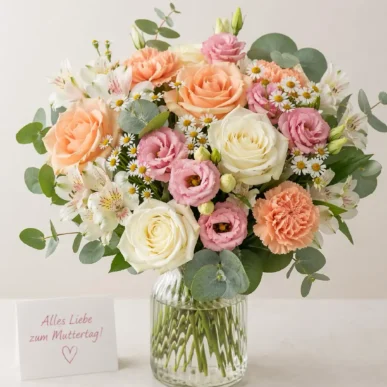kompakt und rund gebundener Blumenstrauss in apricot und pink toenen